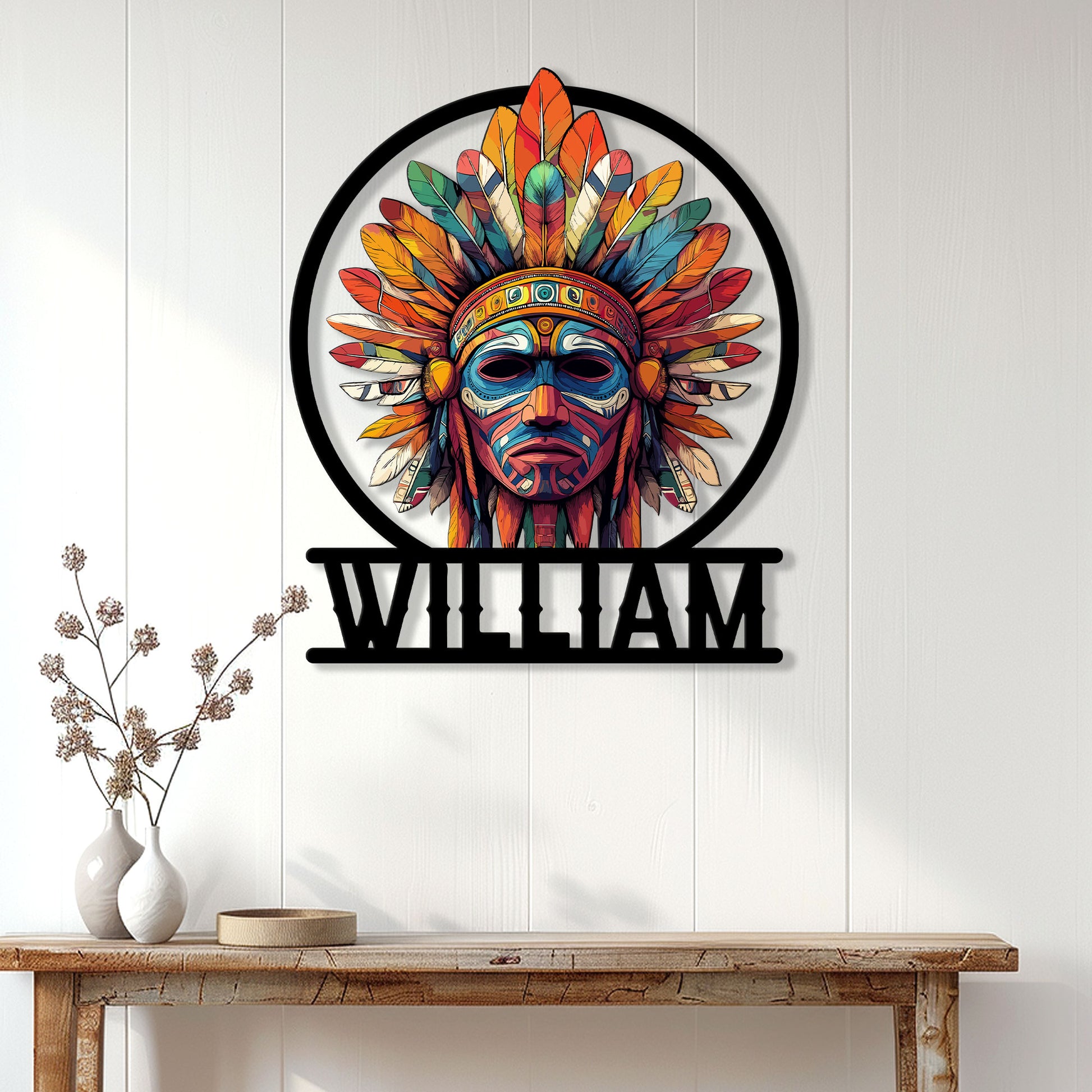 Native American-inspired feathered mask wall sign displayed above a console table in a bright home entryway