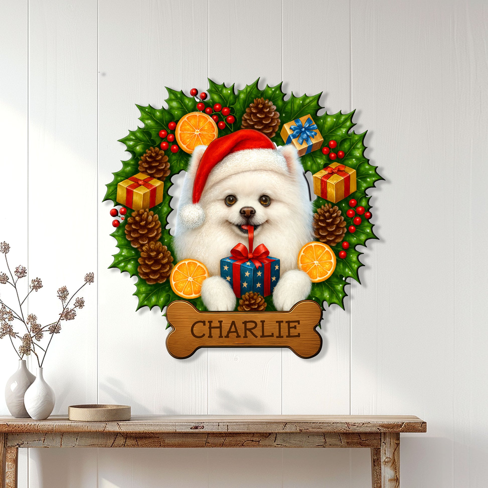 Pomeranian Christmas wall sign displayed on a bright paneled wall above a rustic console table