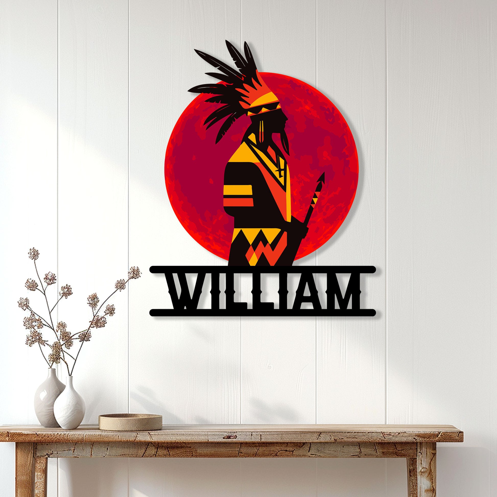 Native American wall decor displayed on a light wood-paneled wall above a console table