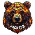 Stained-glass style bear portrait metal sign with rich amber, brown, blue, and purple tones