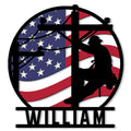 Lineman metal sign featuring a utility worker silhouette against an American flag design