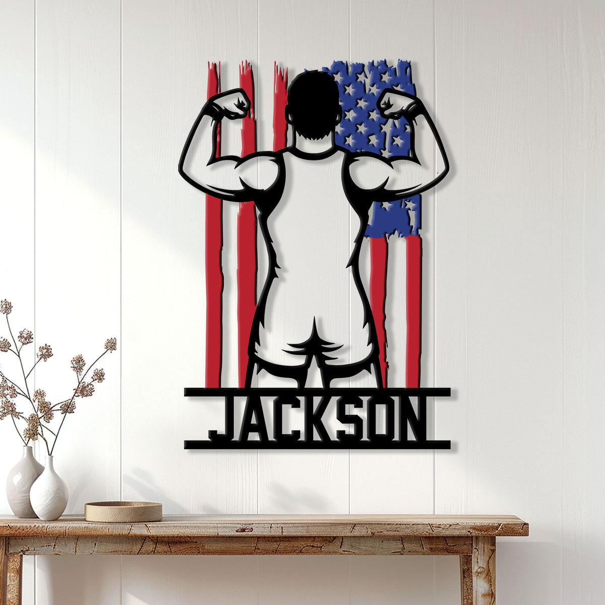 Patriotic wrestling wall sign displayed on a bright wood-paneled wall above a console table