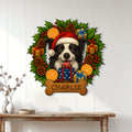 Christmas Border Collie wall sign displayed on white paneling above a console table