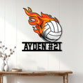 Flaming volleyball wall sign displayed on a bright paneled wall above a wooden console
