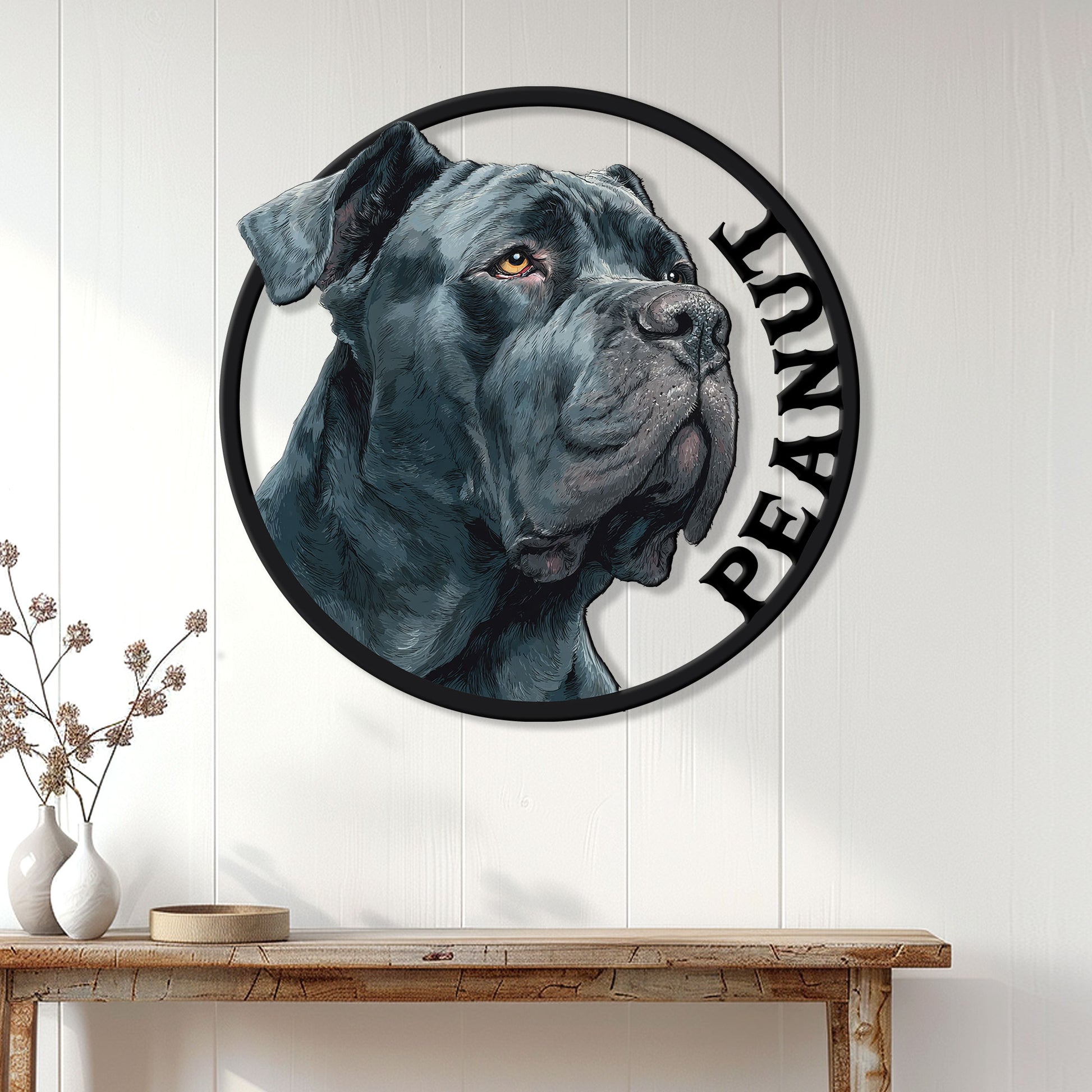 Cane Corso metal wall sign displayed above a wood console in a bright home entryway