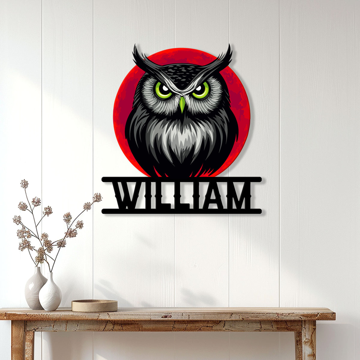 Fierce owl metal wall sign displayed on a light wood-paneled interior wall