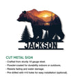 Bear metal sign feature graphic showing a mountain sunset landscape and cut metal sign details