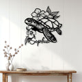 Floral sea turtle wall sign displayed above a console table in a bright, modern home