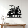 Tractor metal wall sign displayed on a light wood-paneled wall above a console table