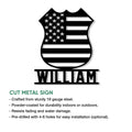 Cut metal police badge sign featuring an American flag design and indoor or outdoor display details