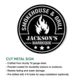 Cut metal BBQ sign featuring a circular smokehouse badge, central flame design, and grill decor style