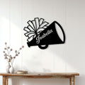 Cheerleading megaphone wall sign displayed on a bright paneled interior wall