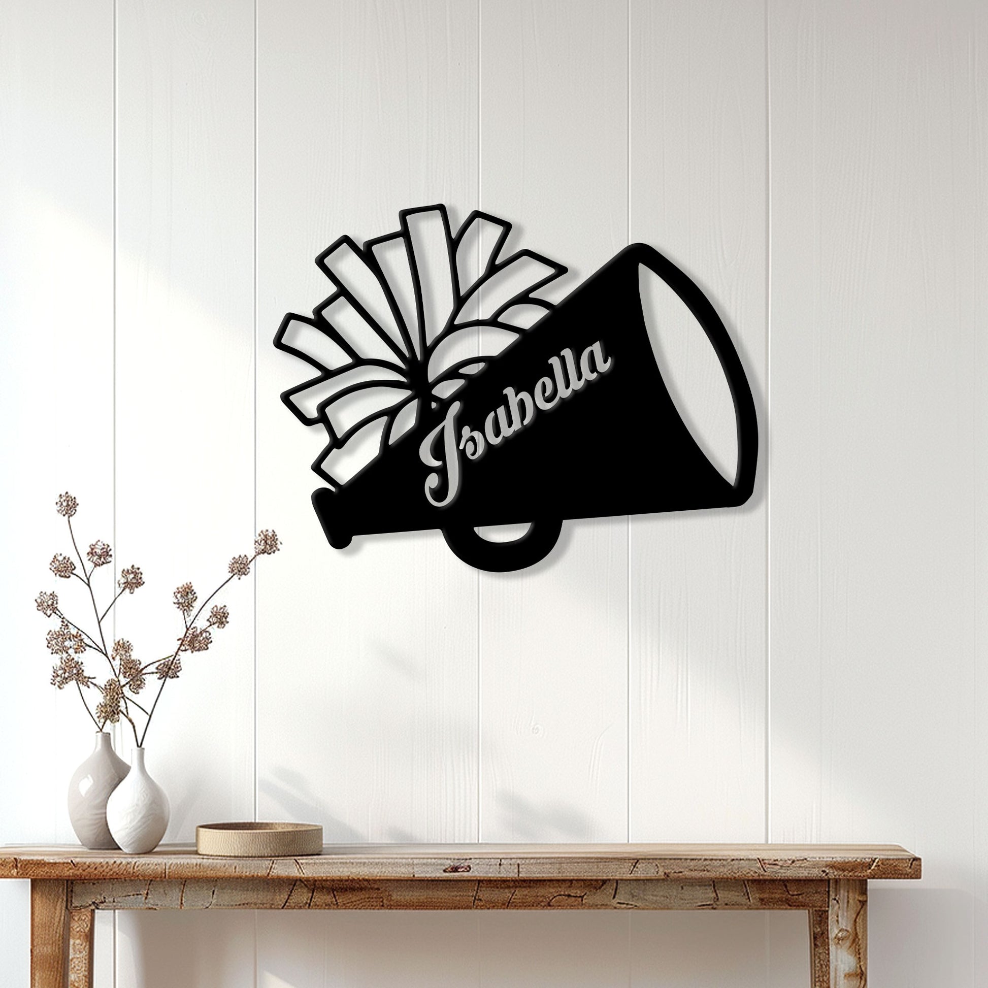 Cheerleading megaphone wall sign displayed on a bright paneled interior wall