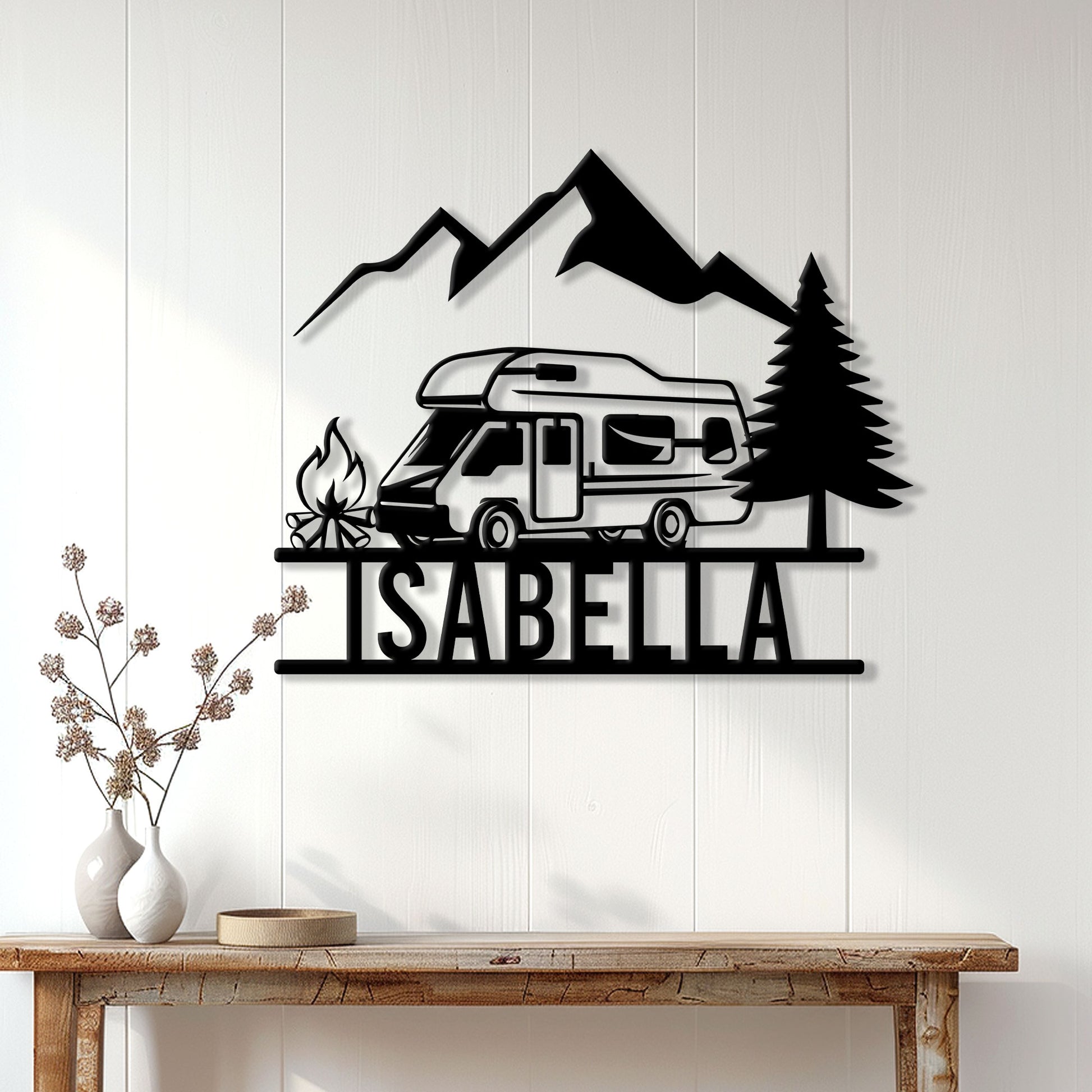 RV camping wall sign displayed on a light wood-paneled wall above a console table