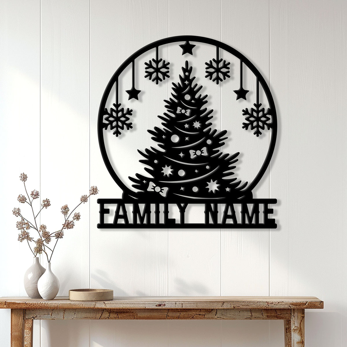 Christmas family metal sign displayed on a white paneled wall above a console table