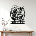Bass fishing wall decor displayed above a console table in a bright, modern home
