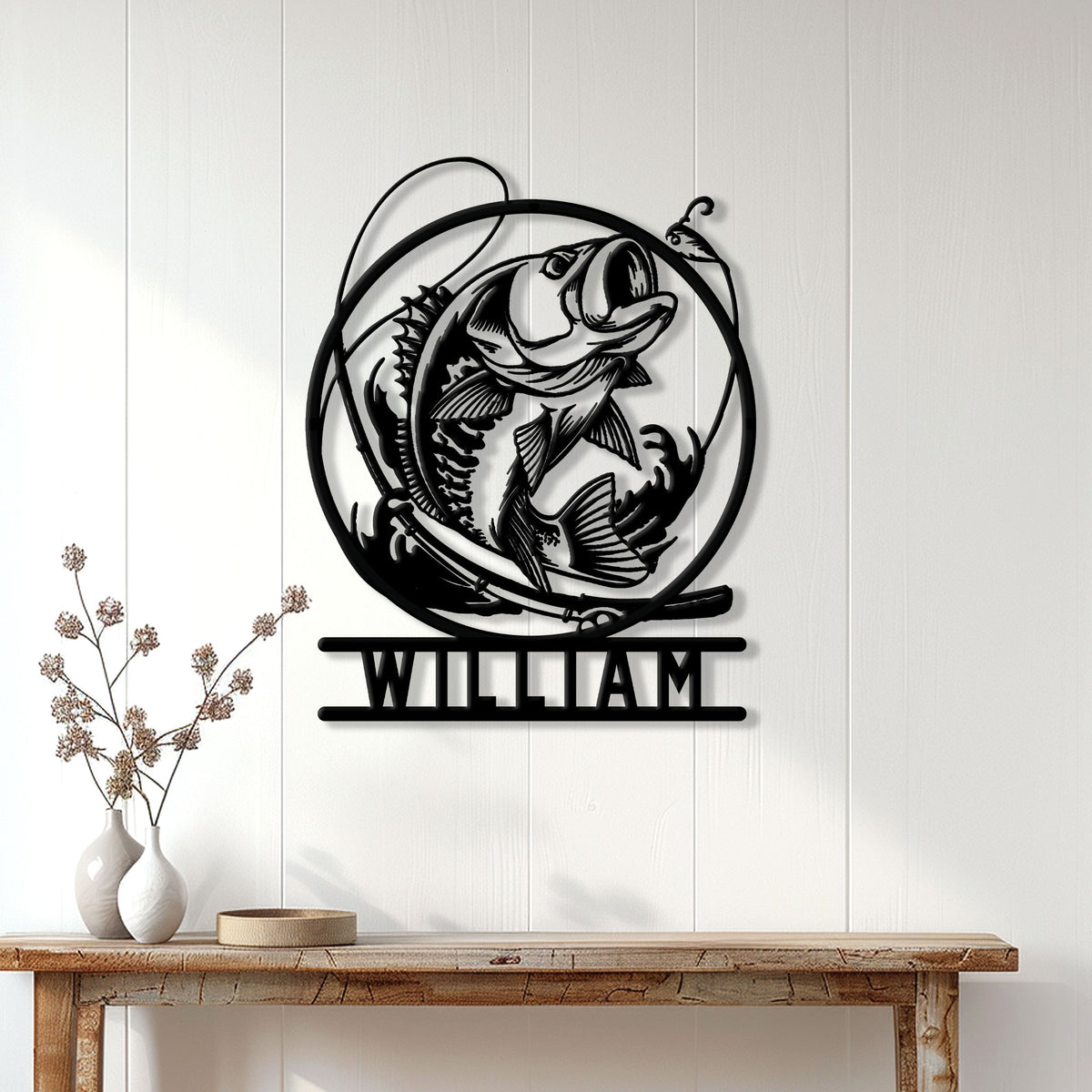 Bass fishing wall decor displayed above a console table in a bright, modern home