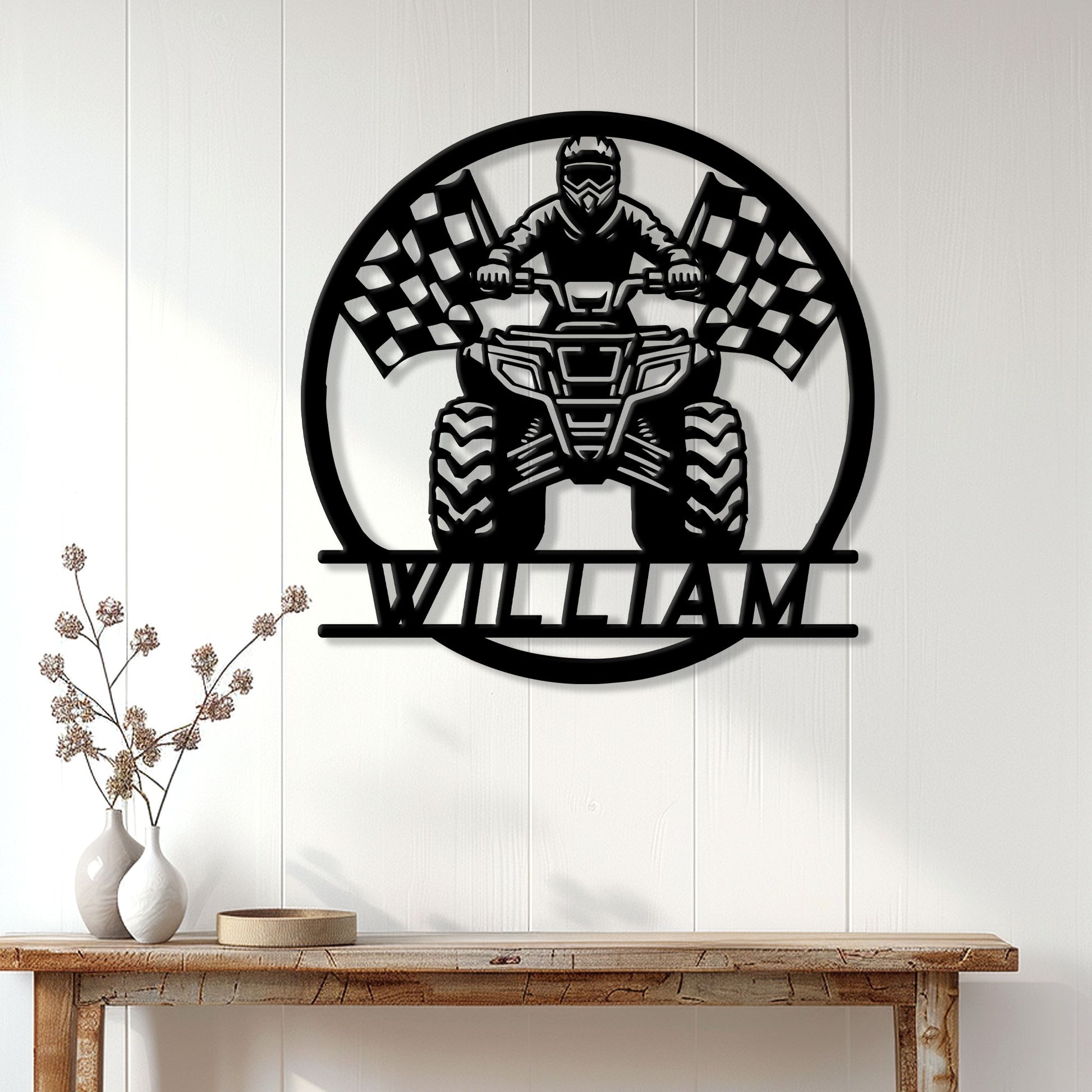 ATV wall sign displayed on a light wood-paneled wall above a console table