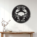 Crab metal wall sign displayed on white paneled walls above a rustic console table