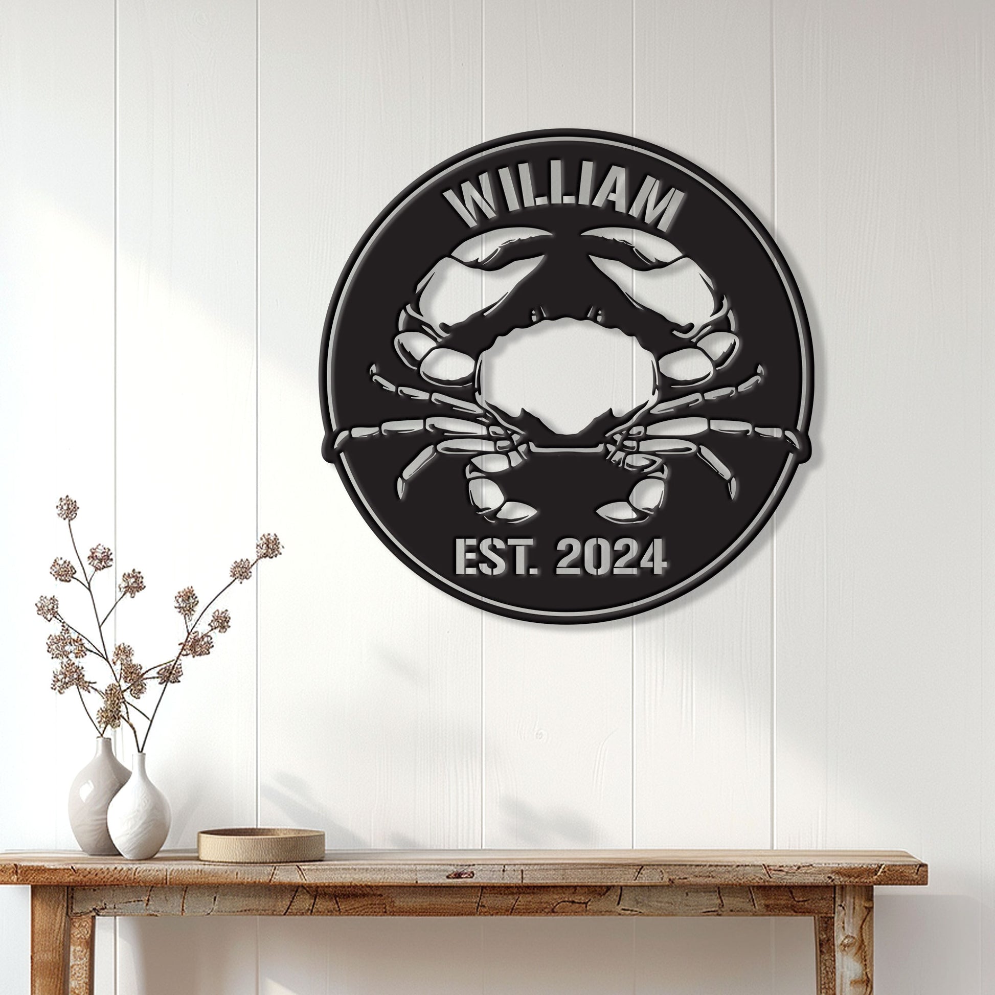 Crab metal wall sign displayed on white paneled walls above a rustic console table