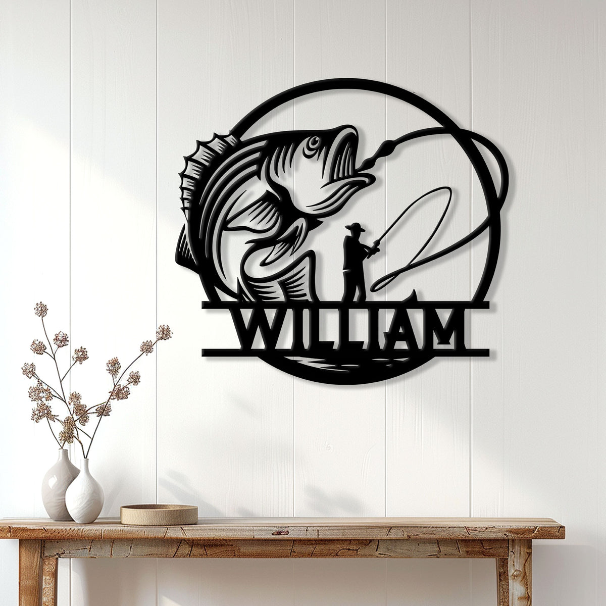 Bass fishing wall decor displayed above a console table, featuring a leaping fish and angler in a home setting
