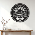 Pizza wall sign displayed above a console table in a bright home interior