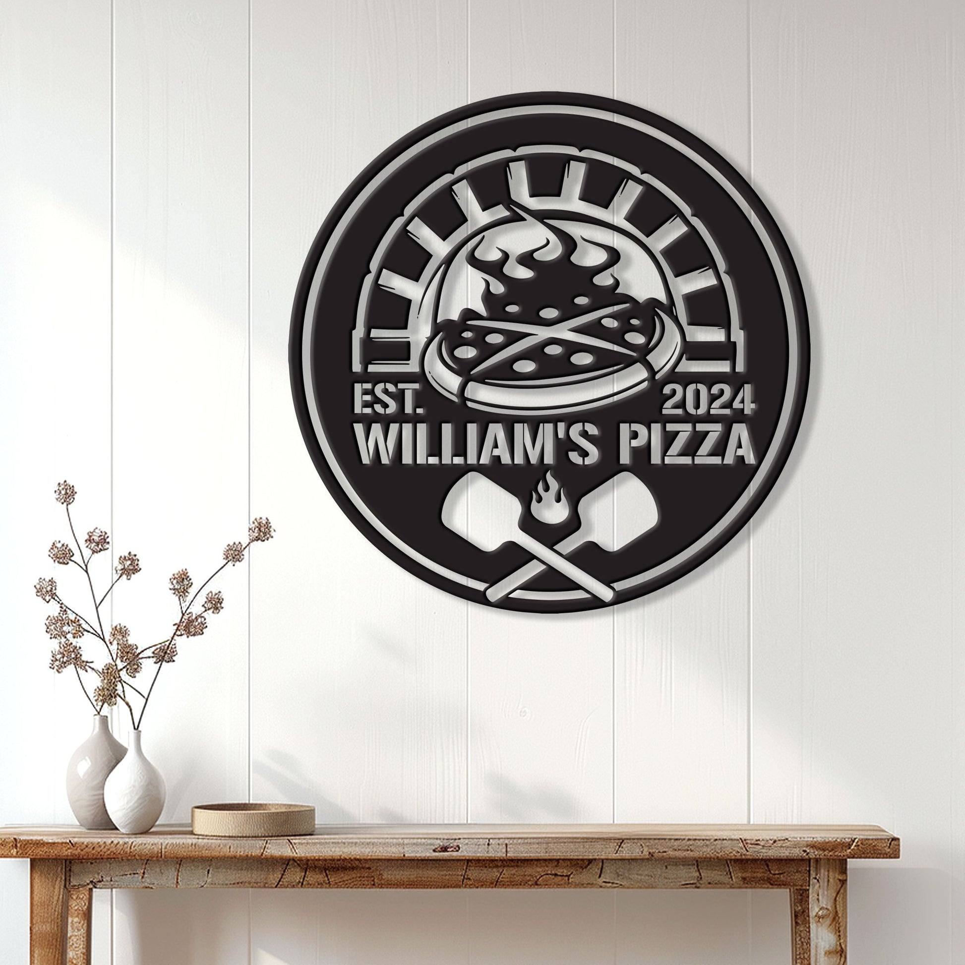 Pizza wall sign displayed above a console table in a bright home interior