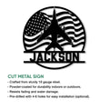 Pilot metal sign with airplane silhouette and American flag design shown as a cut metal wall accent