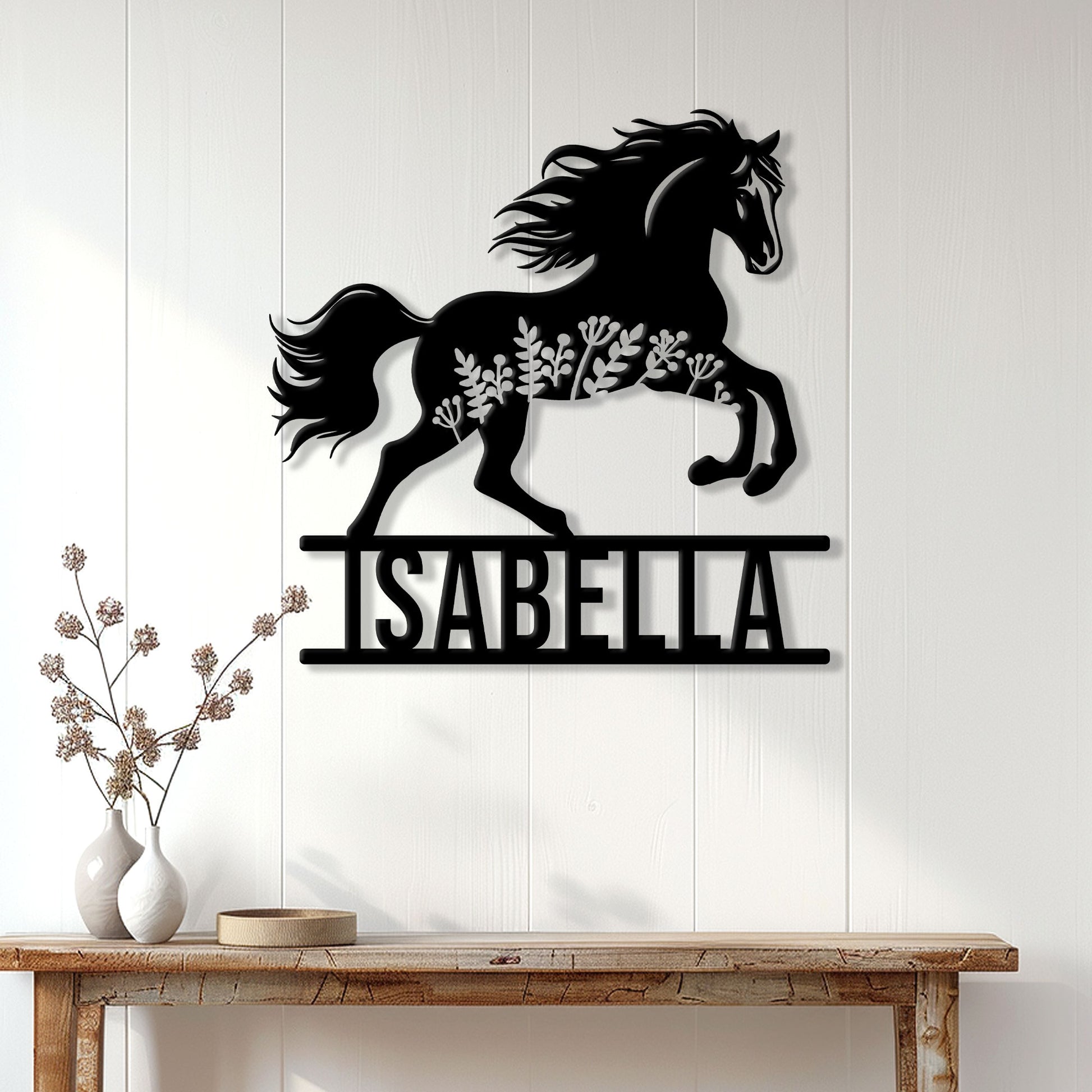 Black horse metal wall decor displayed on a light wood-paneled wall above a console table