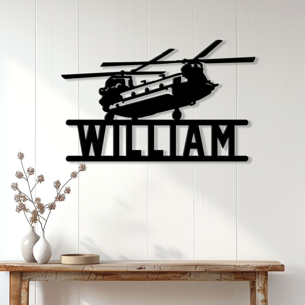 Military helicopter veteran wall sign displayed above a console table in a bright home interior