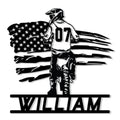 Custom motocross metal sign featuring a helmeted dirt bike rider silhouette with a bold American flag backdrop