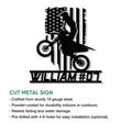 Cut metal motocross sign featuring a dirt bike rider silhouette and bold patriotic flag backdrop