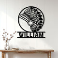 Native American headdress metal wall sign displayed above a console table in a bright home interior
