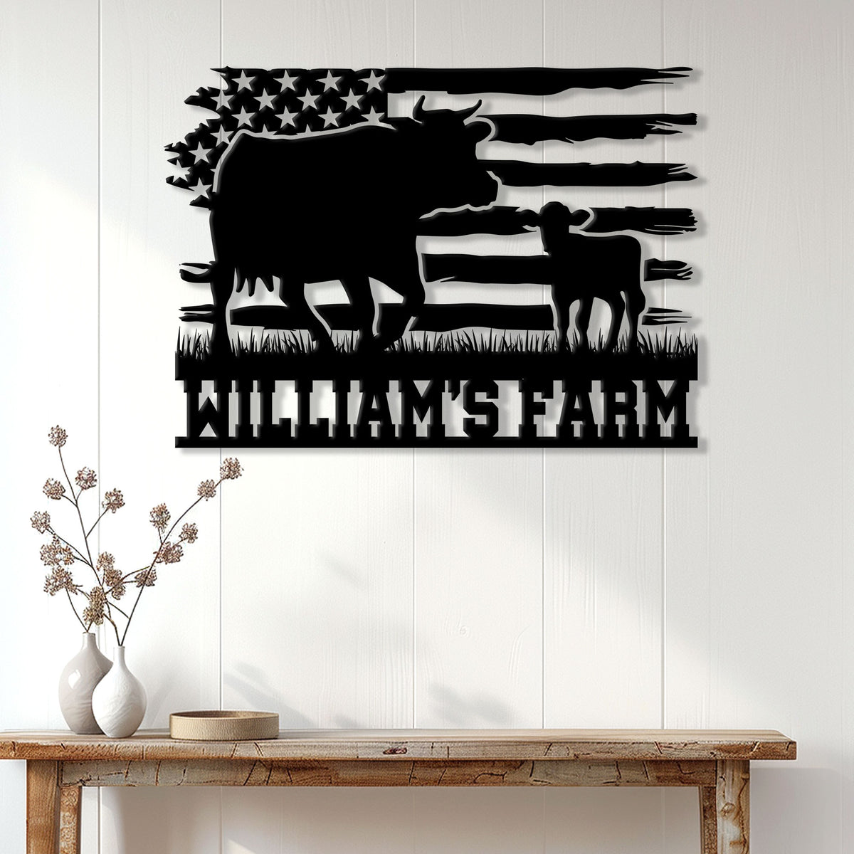 Rustic cow farm metal sign displayed on a white farmhouse wall above a console table