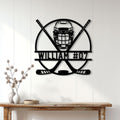 Hockey goalie wall sign displayed above a console table in a bright home interior