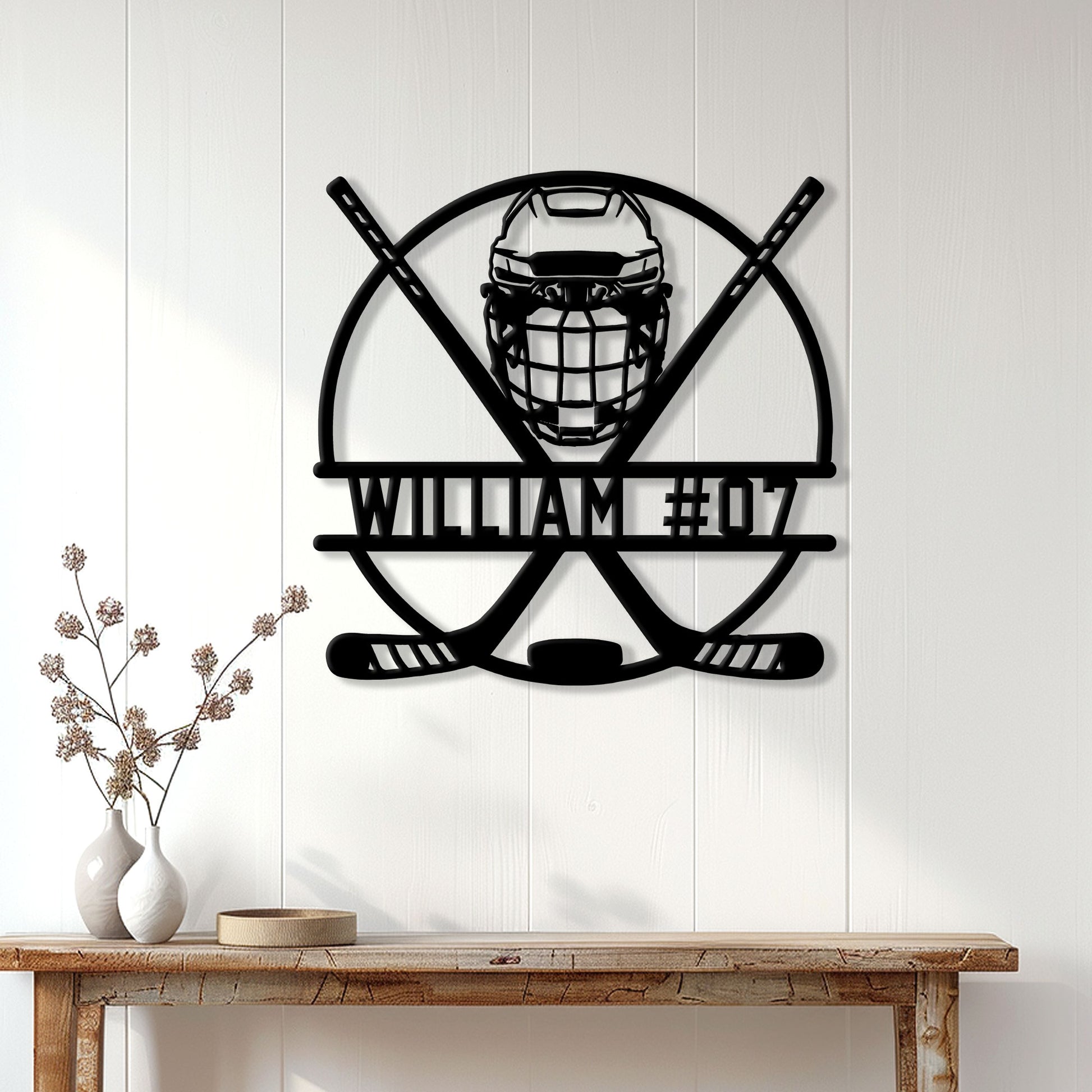 Hockey goalie wall sign displayed above a console table in a bright home interior