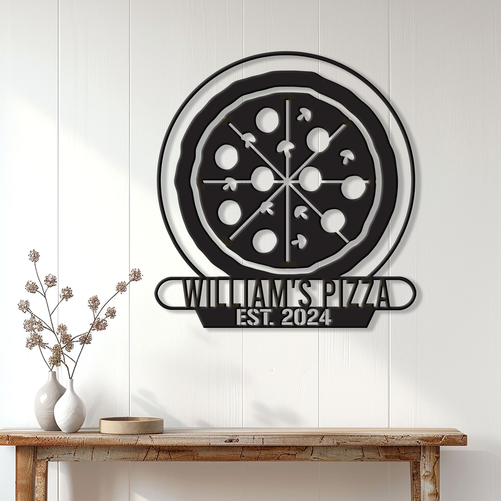 Pizza shop metal sign displayed on a white paneled wall above a rustic console table