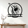 Swimmer wall decor displayed on a bright paneled wall above a console table