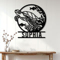 Sea turtle metal wall sign displayed on a white paneled wall above a console table