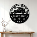 Custom Christmas family sign displayed on a white wall above a wooden console table