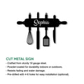 Cut metal kitchen sign featuring a rolling pin silhouette and hanging baking utensils