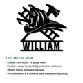 Firefighter cut metal sign shown with a helmet, axes, ladder, hose, and installation feature details