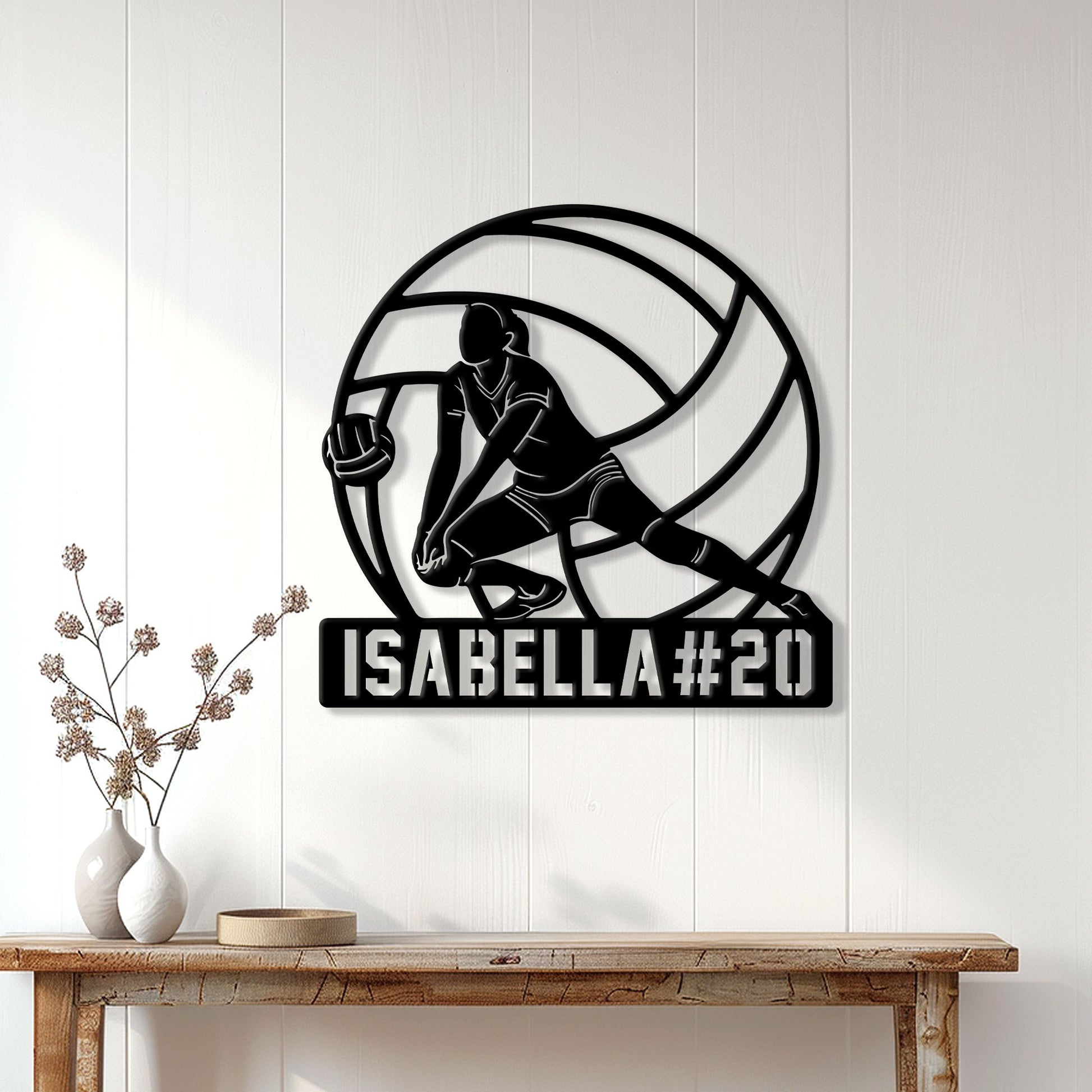 Custom volleyball wall sign displayed on a light wood-paneled wall above a console table