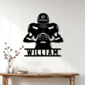Football player skeleton metal sign displayed as striking wall decor in a bright modern living space