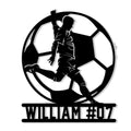 Black soccer player silhouette kicking a ball on a custom metal sign with a bold athletic design
