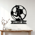 Soccer player silhouette metal sign displayed as modern wall decor above a console table