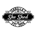 Custom She Shed metal sign with ornate scrollwork and a bold black plaque design