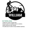 Cut metal mountain biking sign with a rider, bicycle, mountain silhouette, and outdoor adventure design