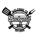 Custom backyard BBQ metal sign with crossed grill tools, welcome message, and circular barbecue emblem