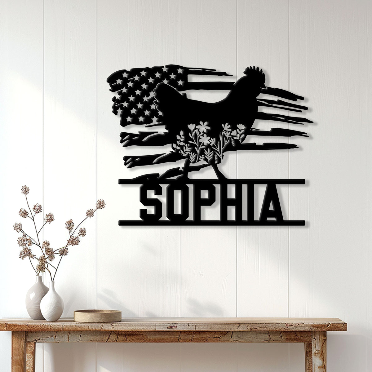 Black chicken metal wall sign displayed on a bright farmhouse wall above a rustic wood console